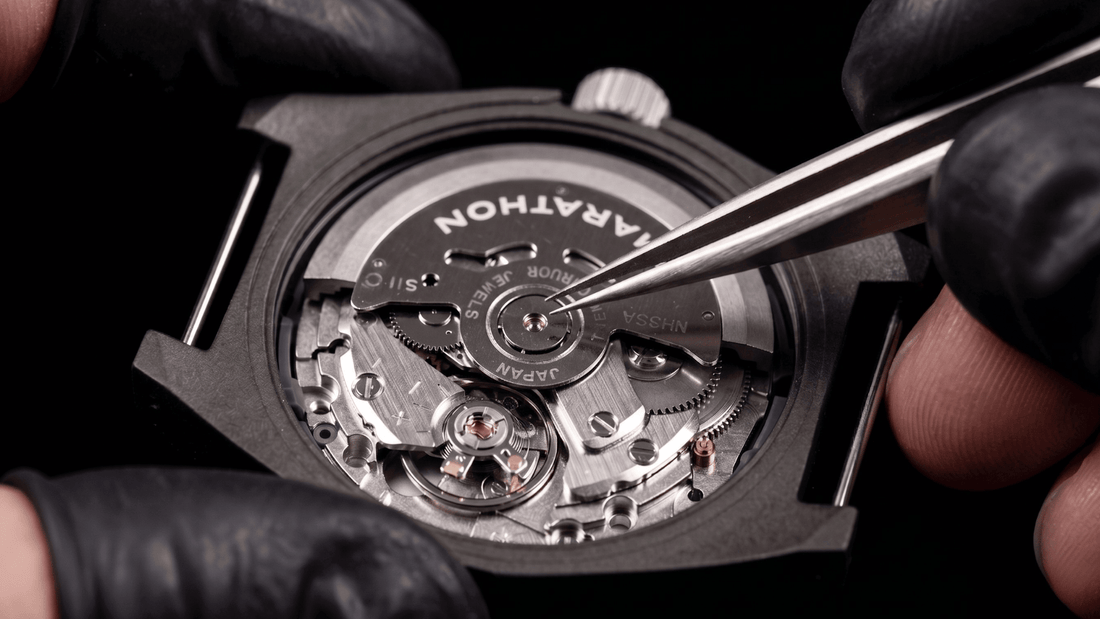 Marathon watch caseback featuring official military specification and government contract engravings.