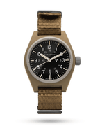 Front view of the Marathon 34mm Desert Tan GPM. Features a high-impact fibershell case and sterile dial. A rugged staple for military watch collections.