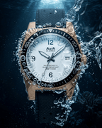 Close-up macro of Alsta Nautoscaph IV bronze watch white dial with black sword hands detail.