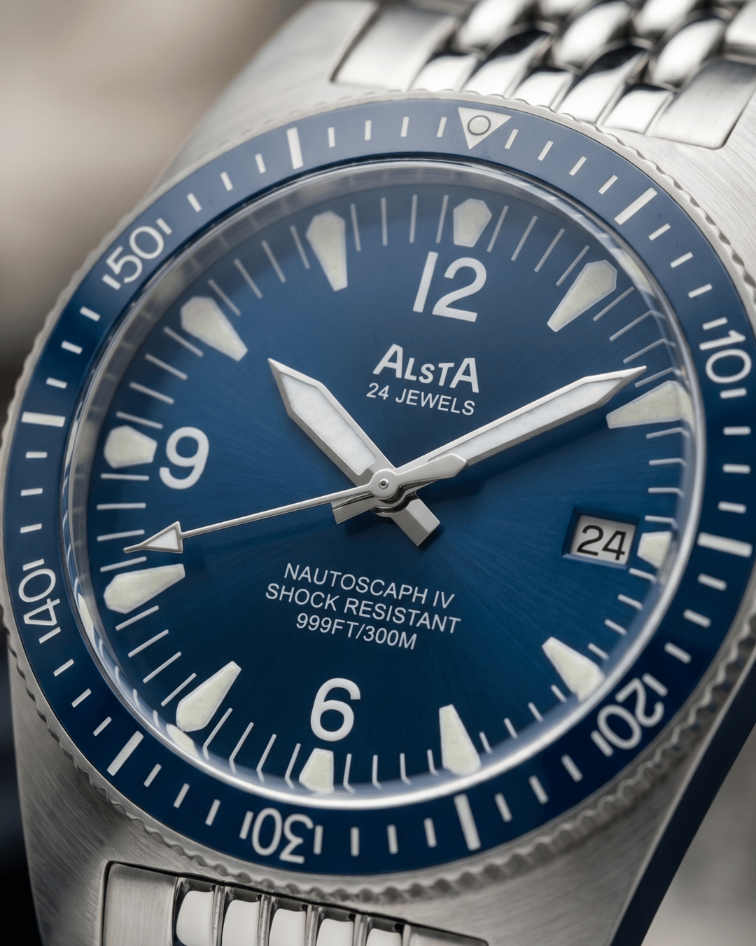 Close-up of the blue sunburst dial from the Alsta Nautoscaph IV, a highlight in luxury watches collections.
